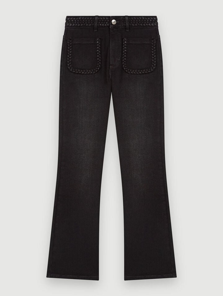 Black jeans, braided finishes on pockets