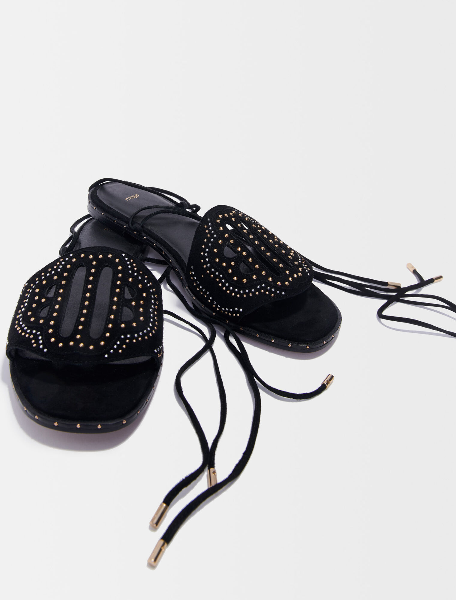 Flat studded sandals