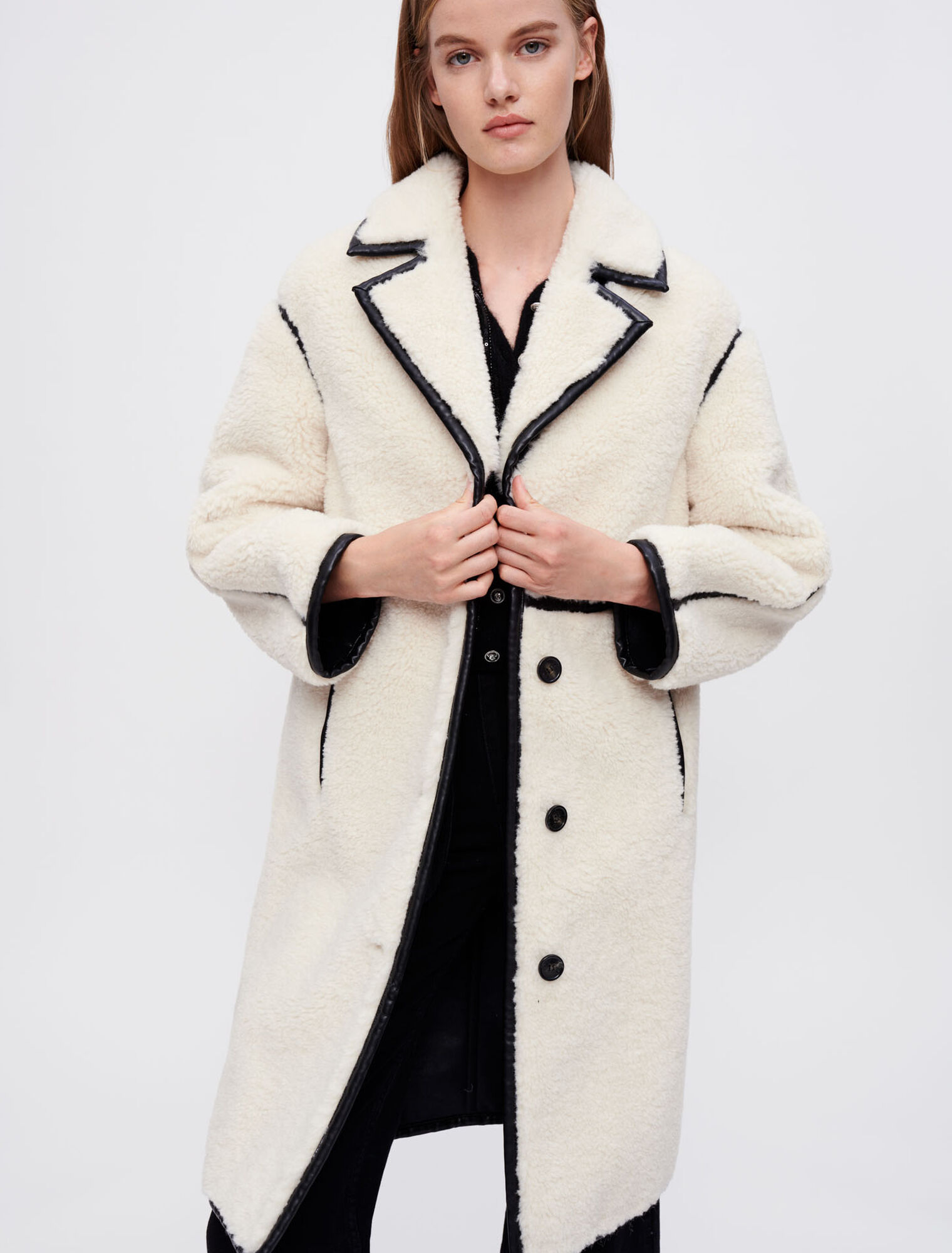 Faux sheepskin and vinyl coat