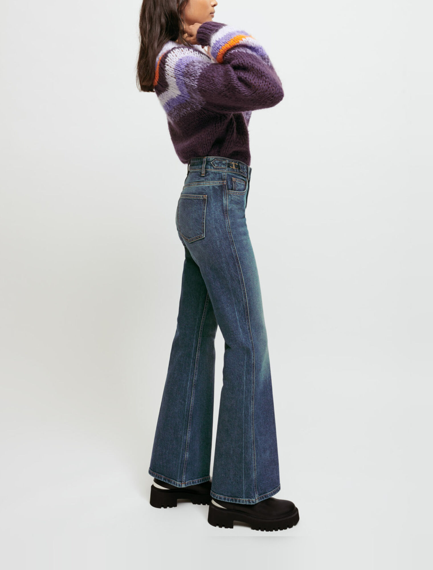 Flared jeans with horsebit detail