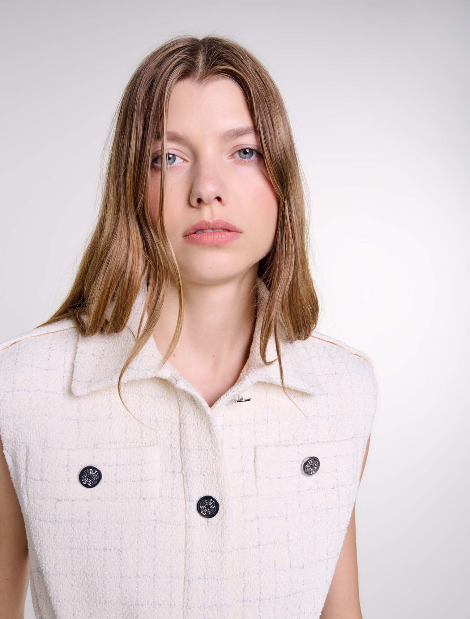Sleeveless tweed jacket