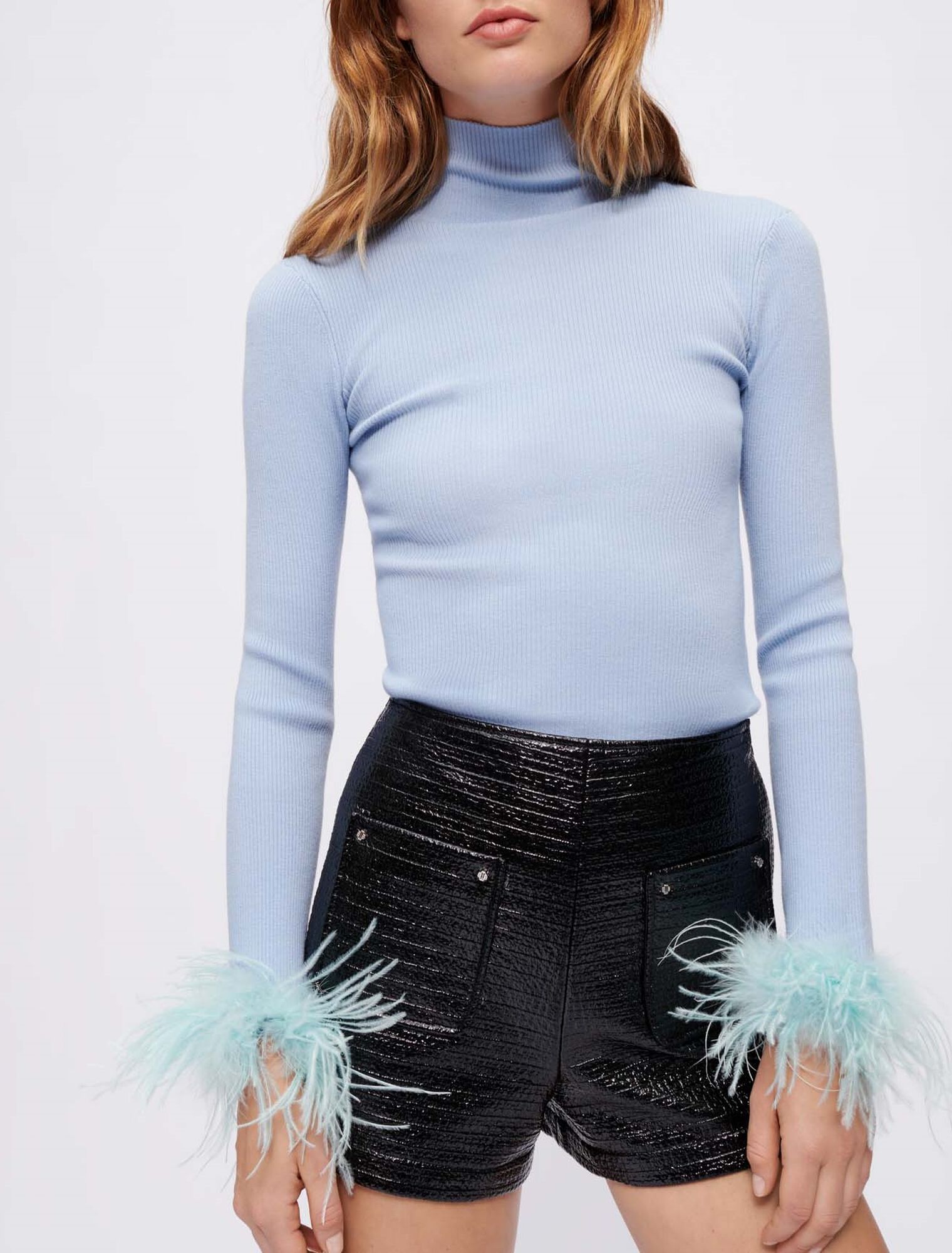 Turtleneck pullover with feathered cuffs