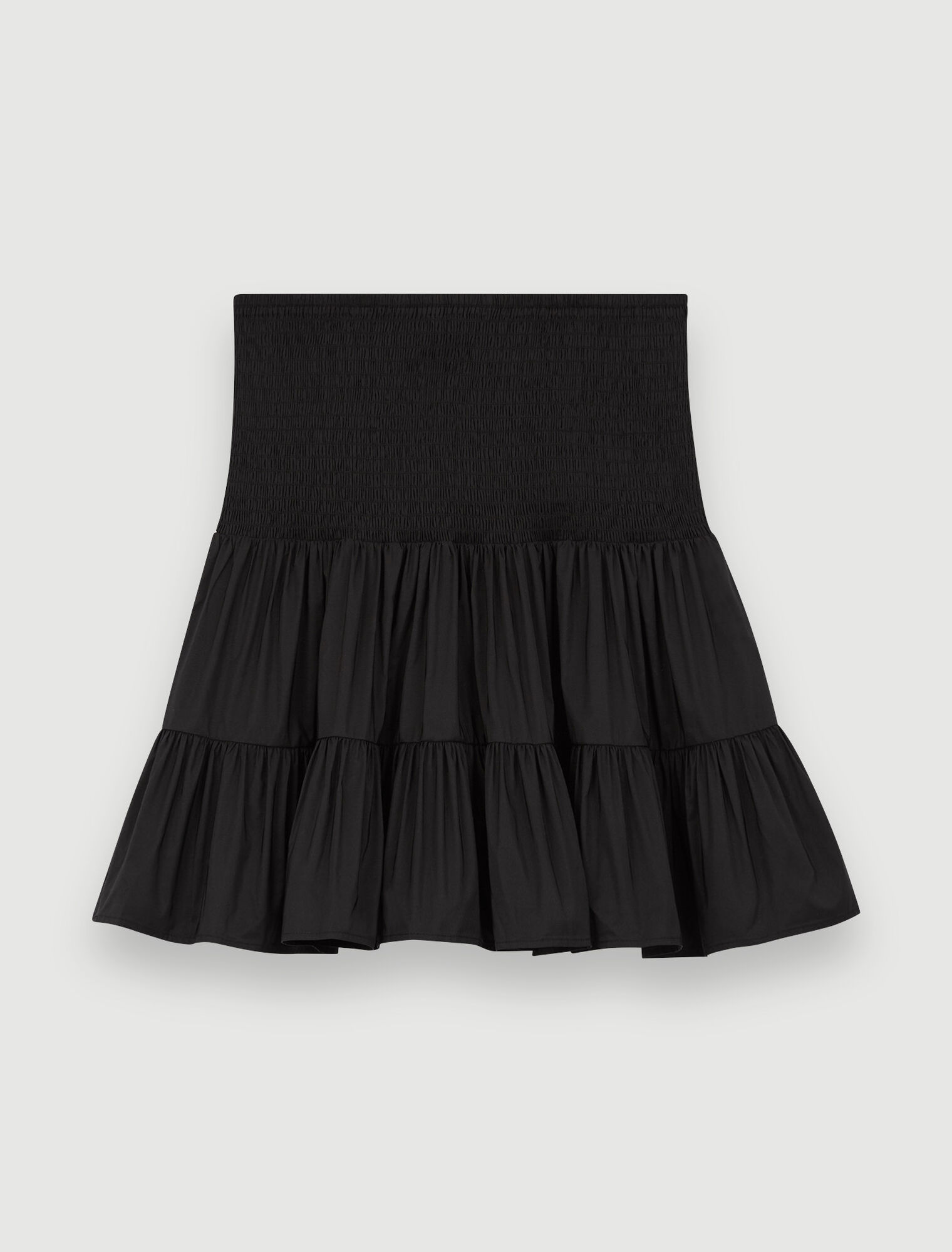 Short skirt with smocking and ruffles