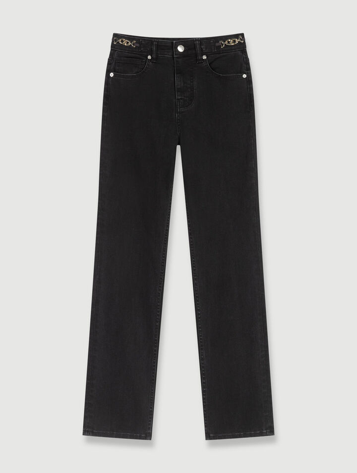 Jeans with curb chains and fringing