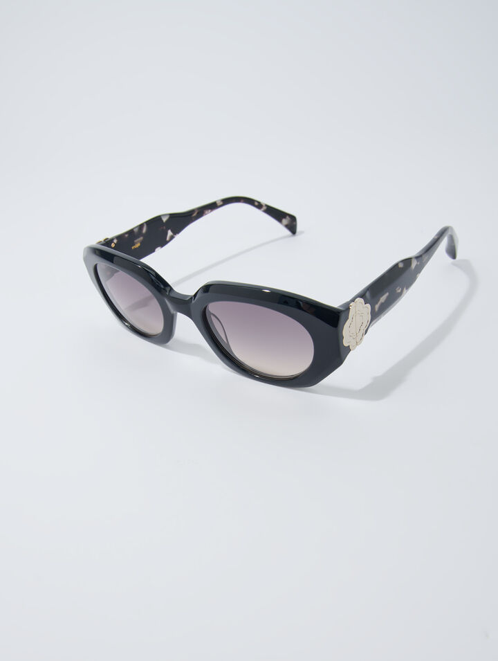 Round acetate glasses