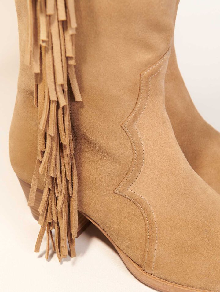 Fringed suede cowboy boots