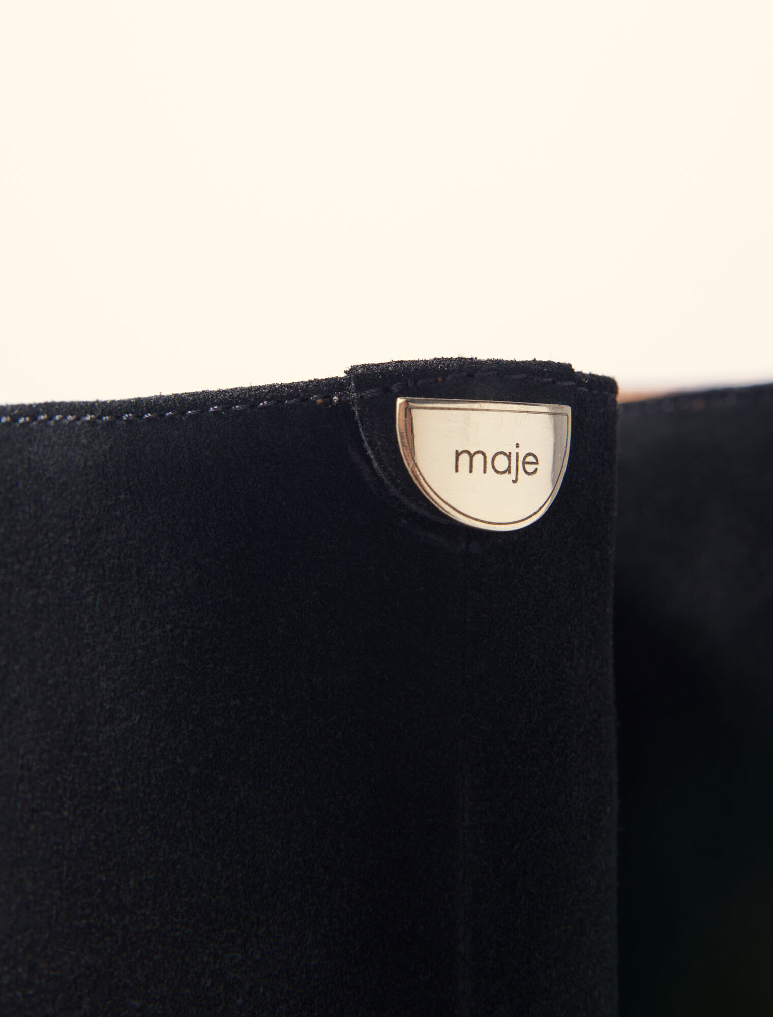 Fringed suede cowboy boots