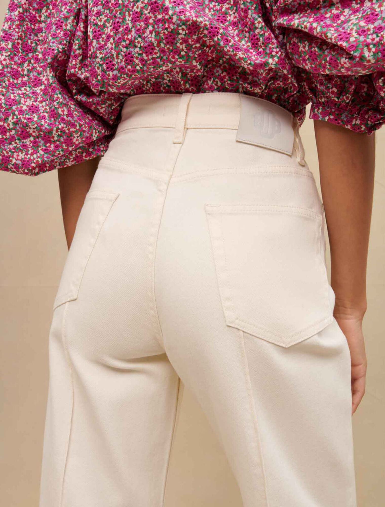 Wide-leg pants with side buttons