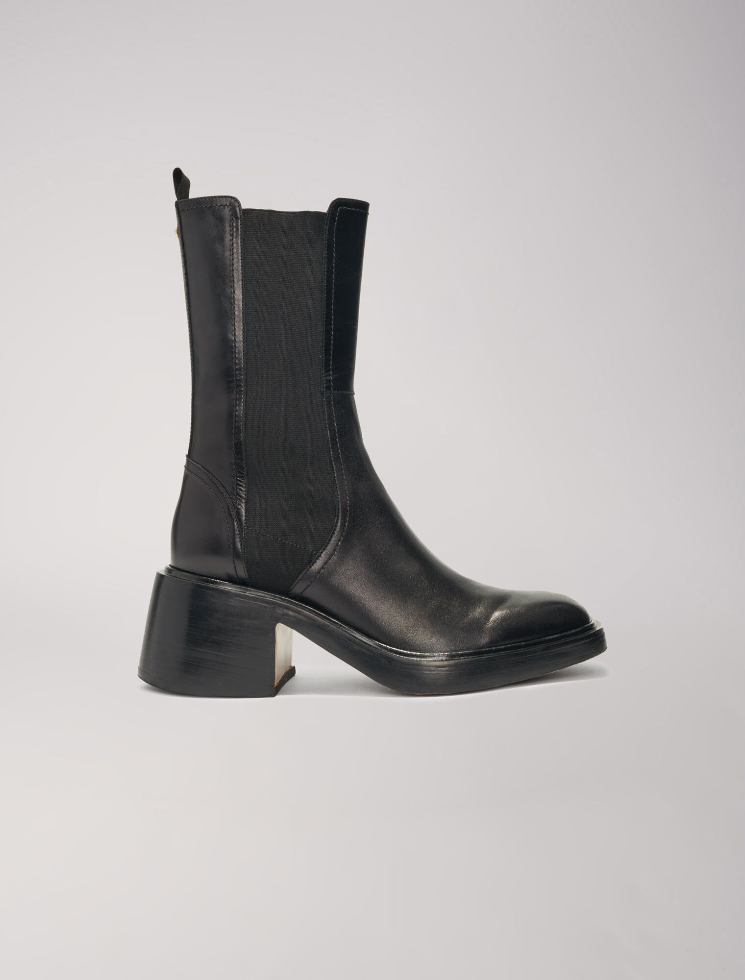 Black leather ankle boots and square toe