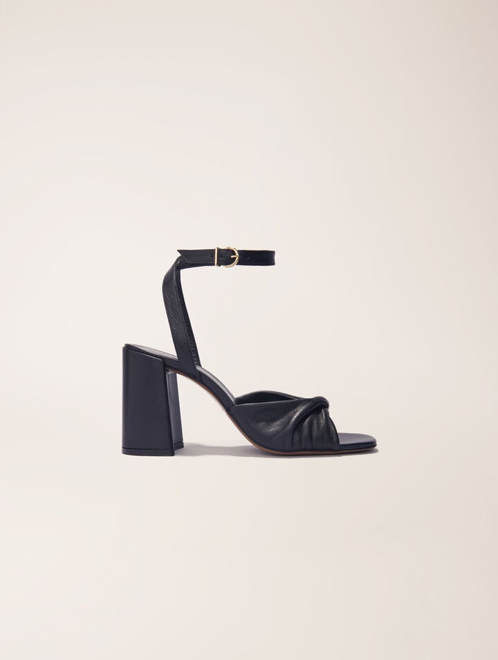 Plain leather sandals with heels