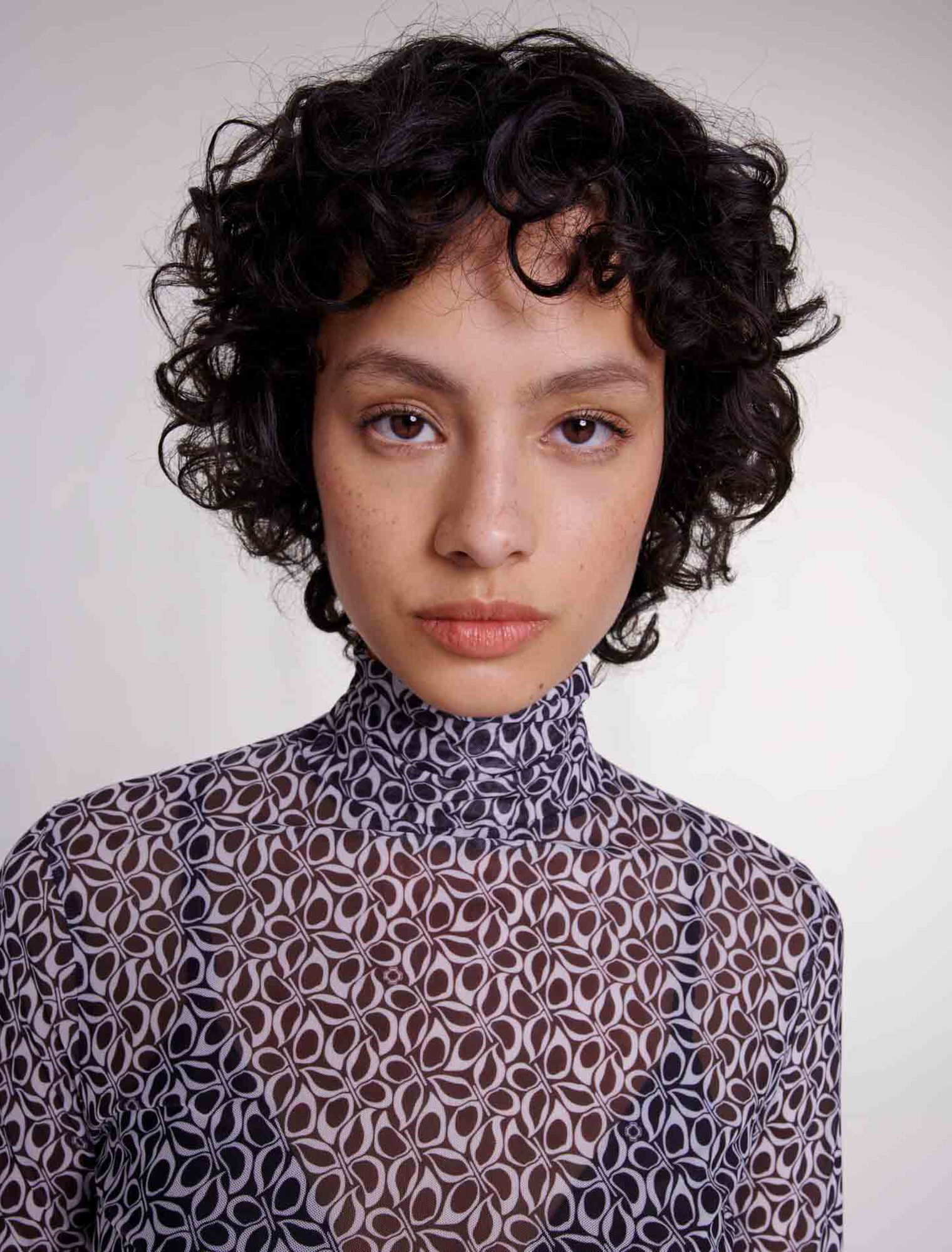 Semi-sheer patterned top