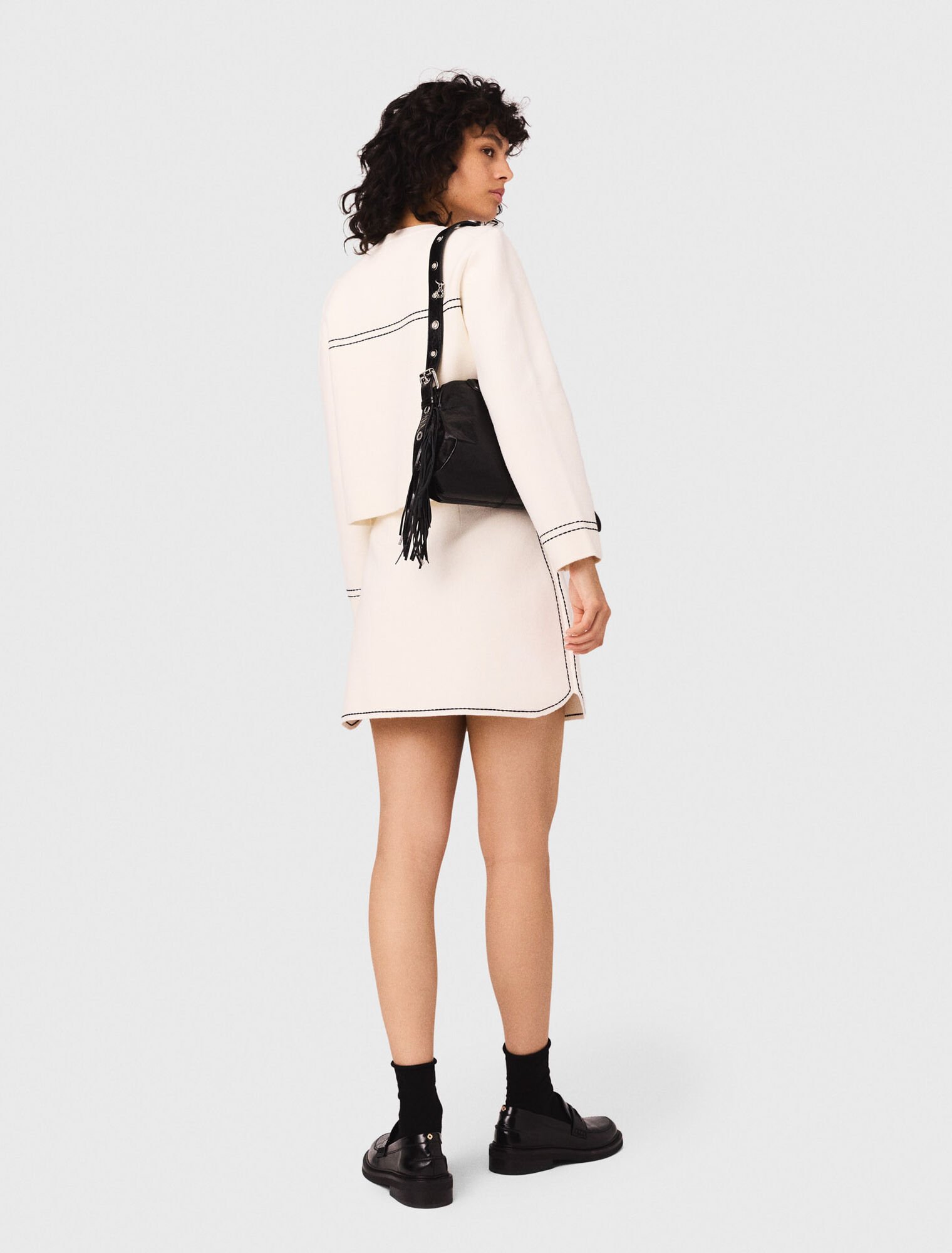Short topstitched knit skirt