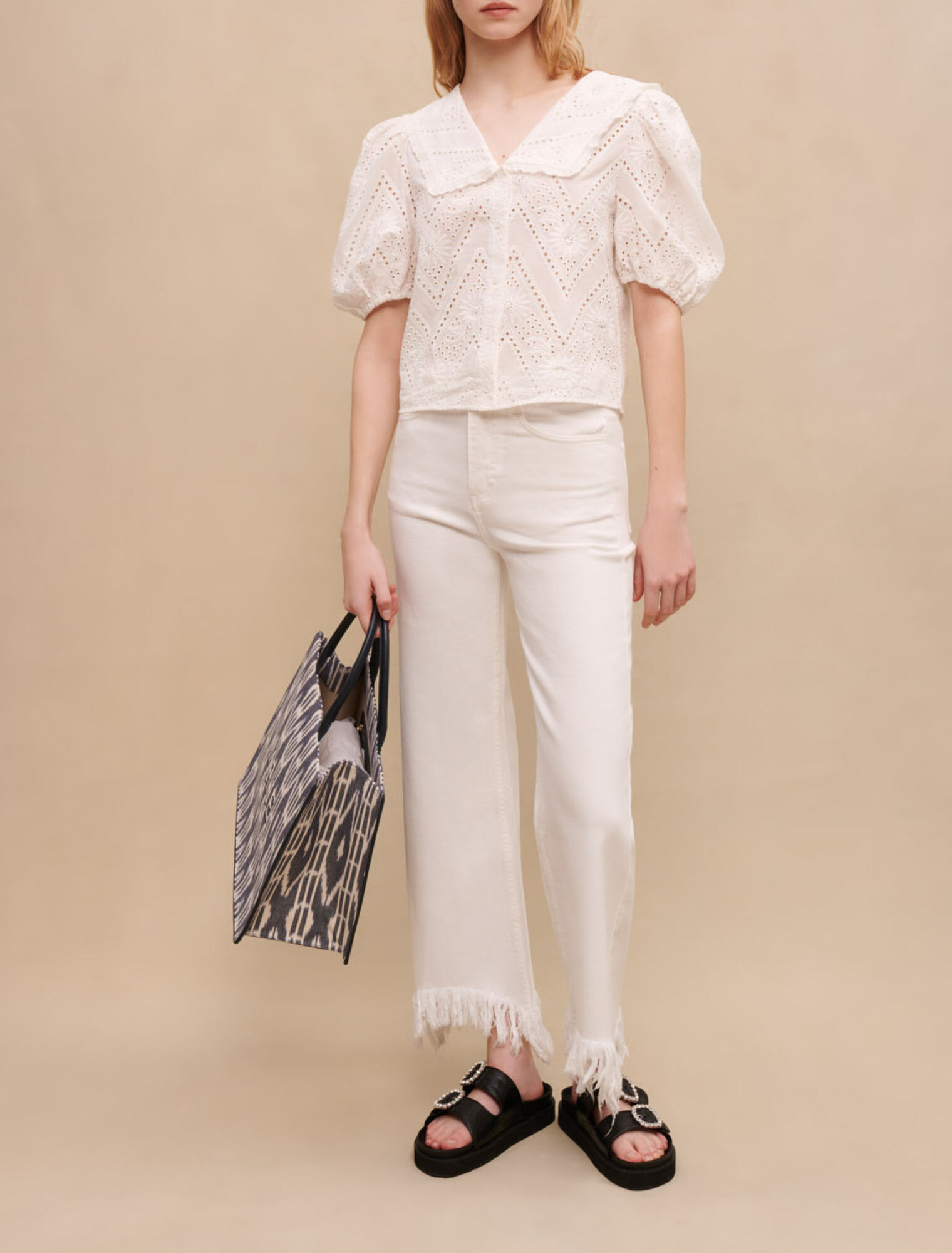 Straight-leg jeans, ripped at bottom