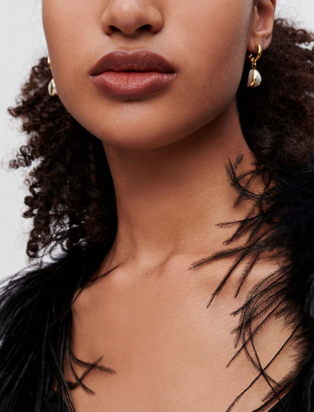 Transparent voile shirt with feathers Transparent voile shirt with feathers