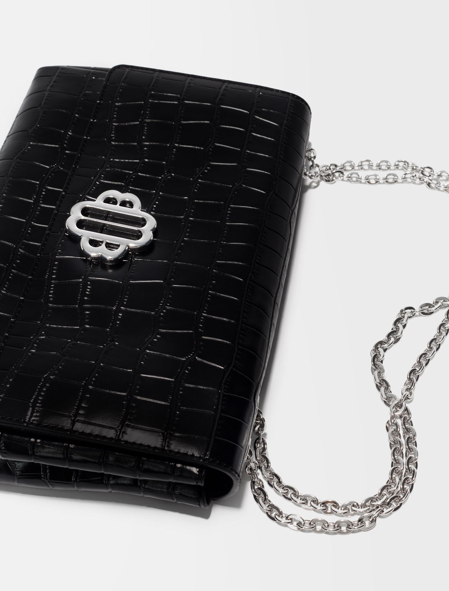 Leather bag with Clover logo