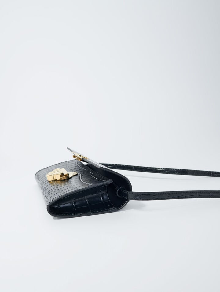 Croc-effect embossed leather bag