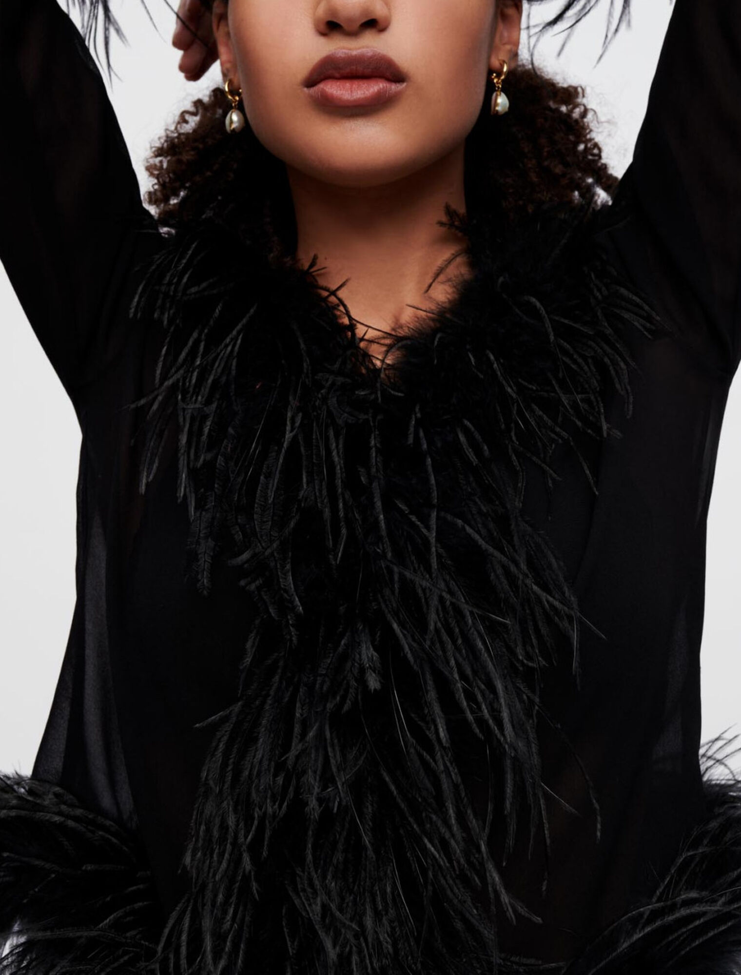 Transparent voile shirt with feathers