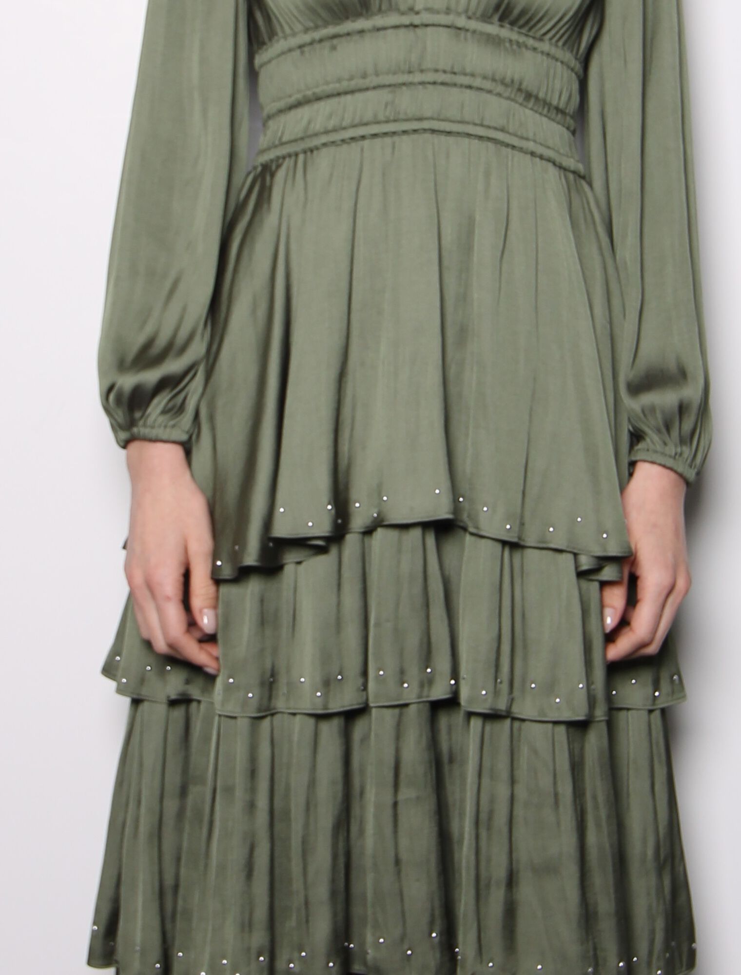 Satin dress with ruffles and studs
