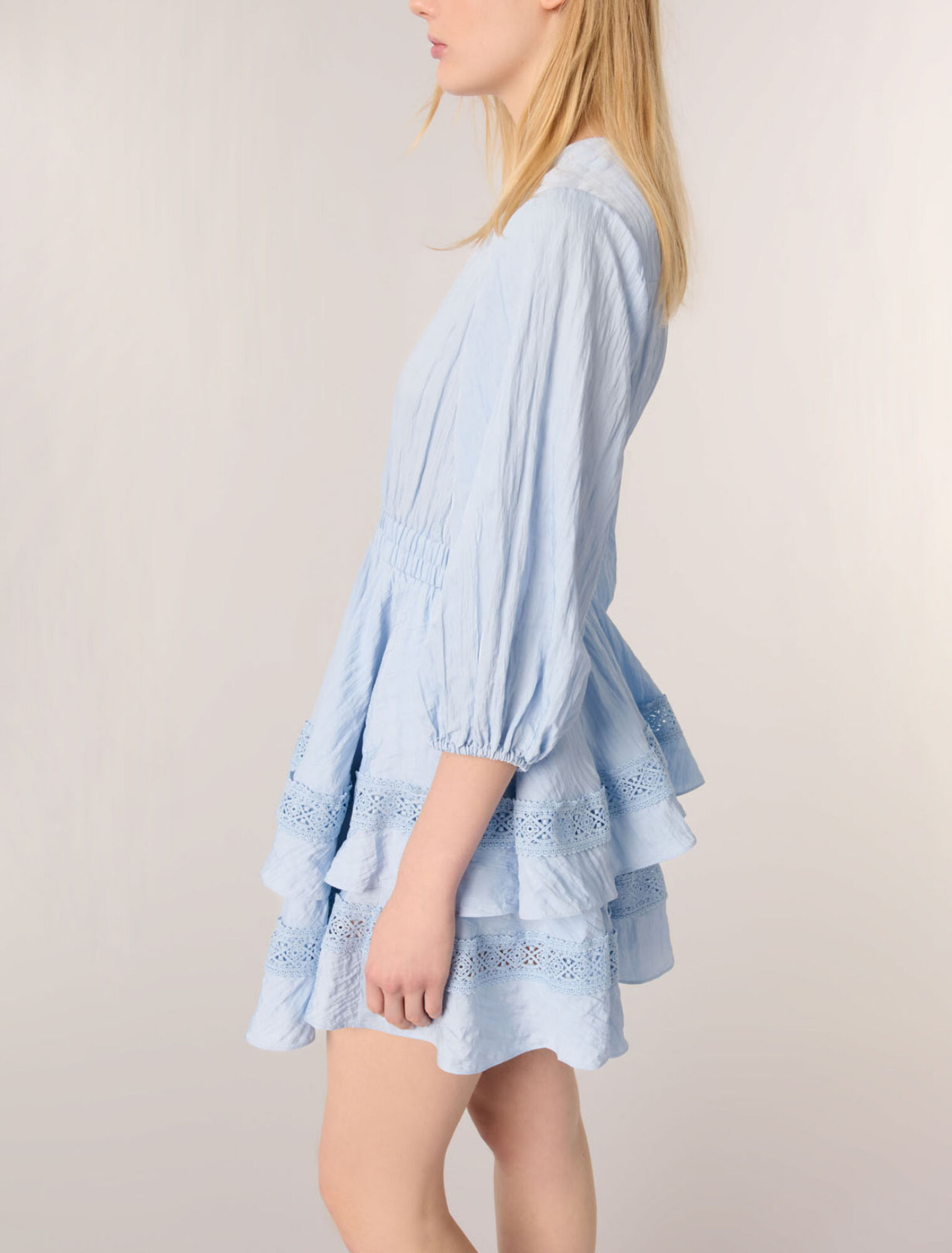Dress with ruffles and lace details