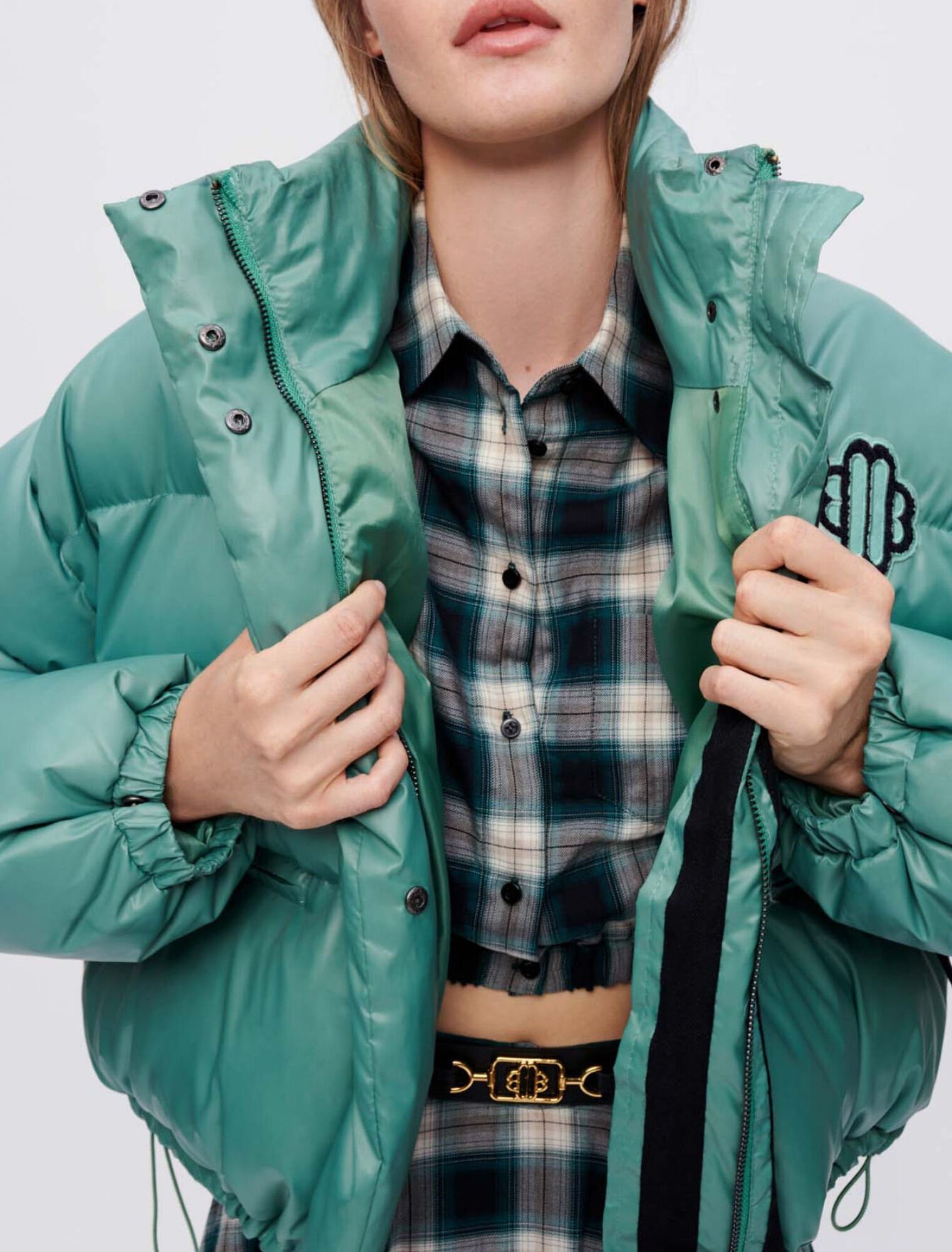 Green down jacket with Maje Clover patch