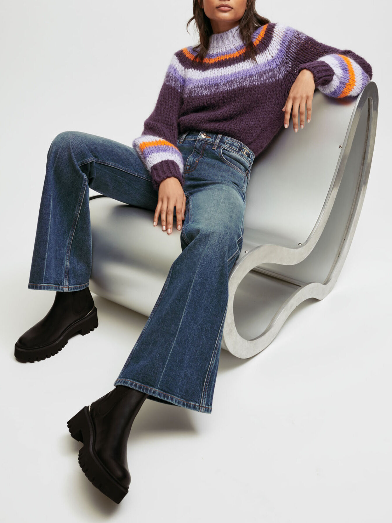 Flared jeans with horsebit detail
