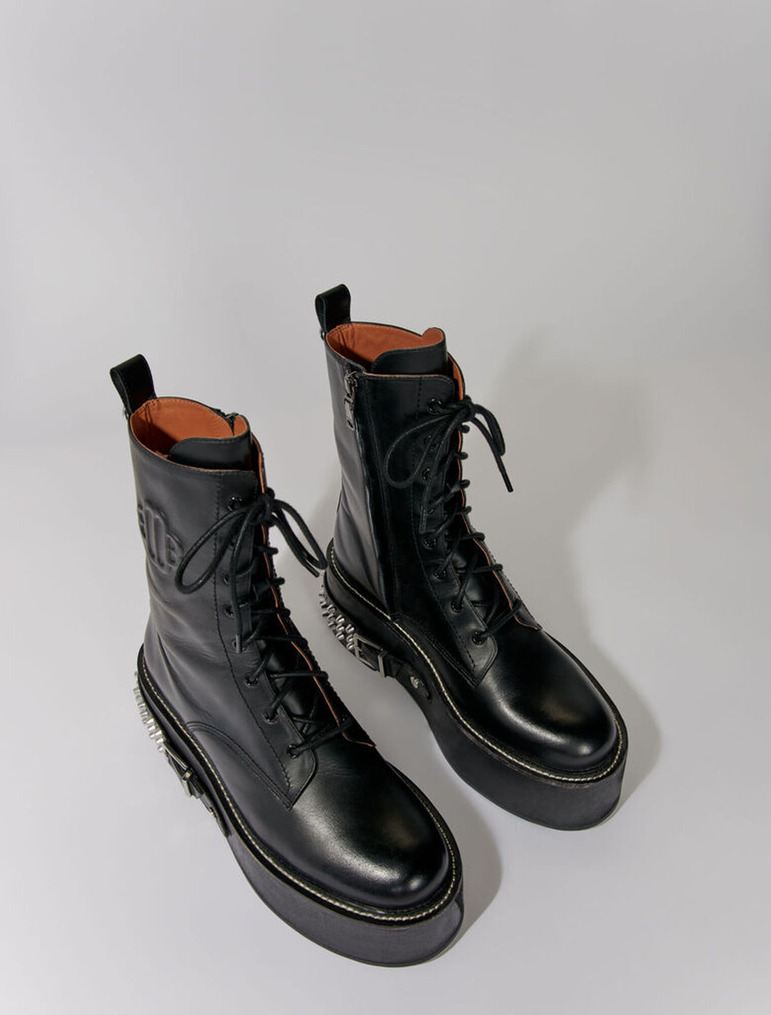 Combat boots with punk details