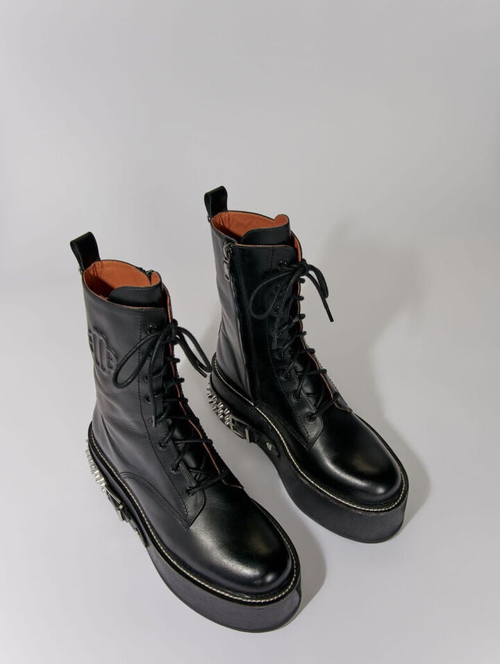 Combat boots with punk details