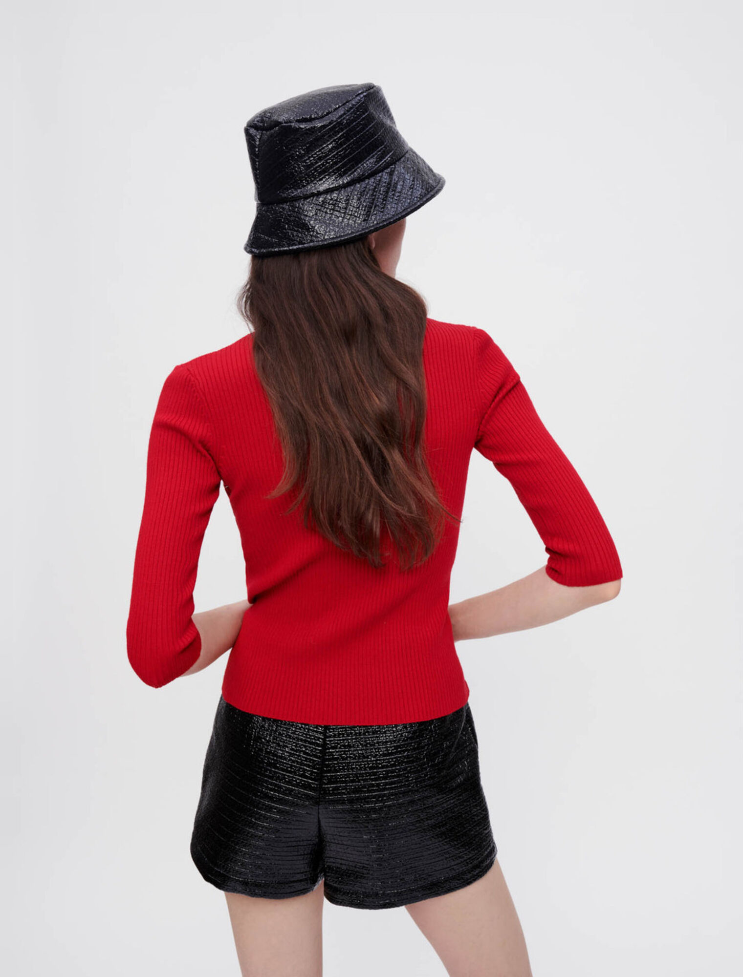 Sweater with silver eyelets