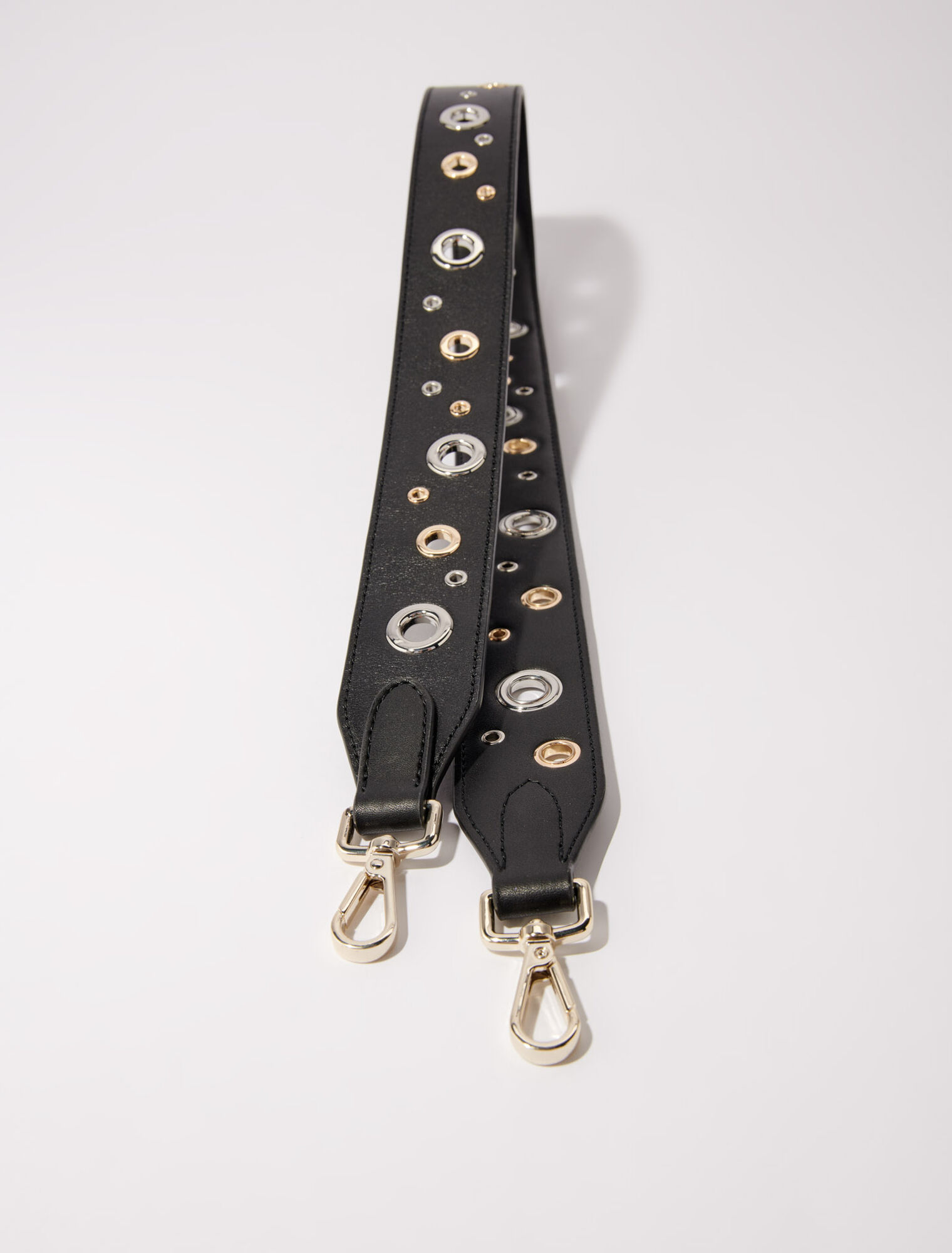 Leather shoulder strap with eyelets
