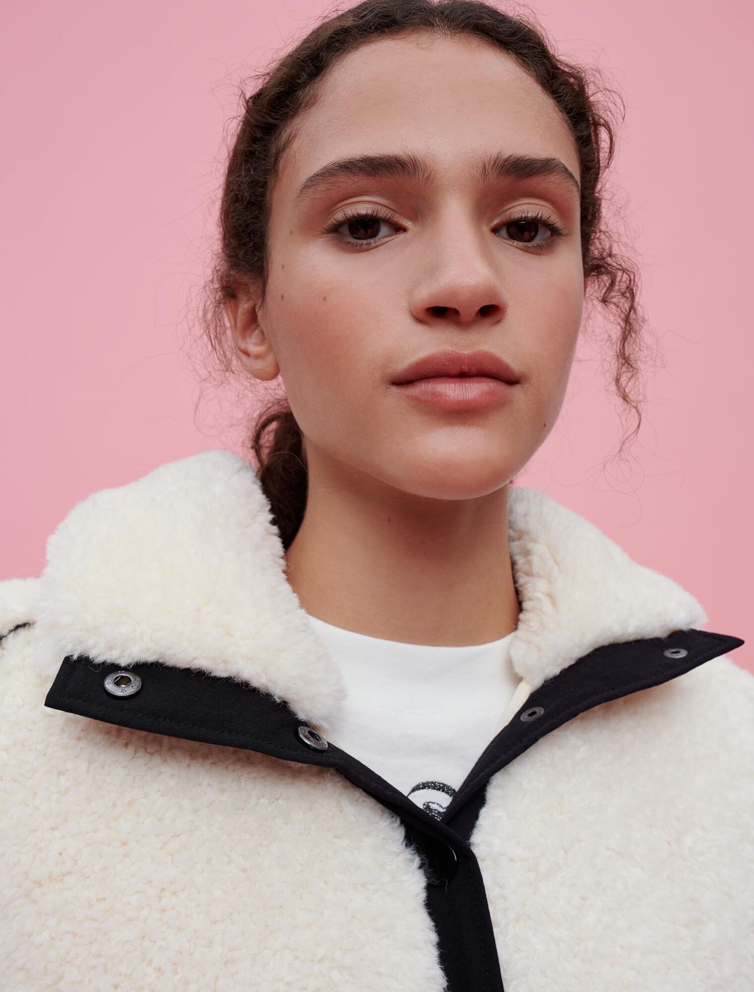 Faux fur and vinyl coat