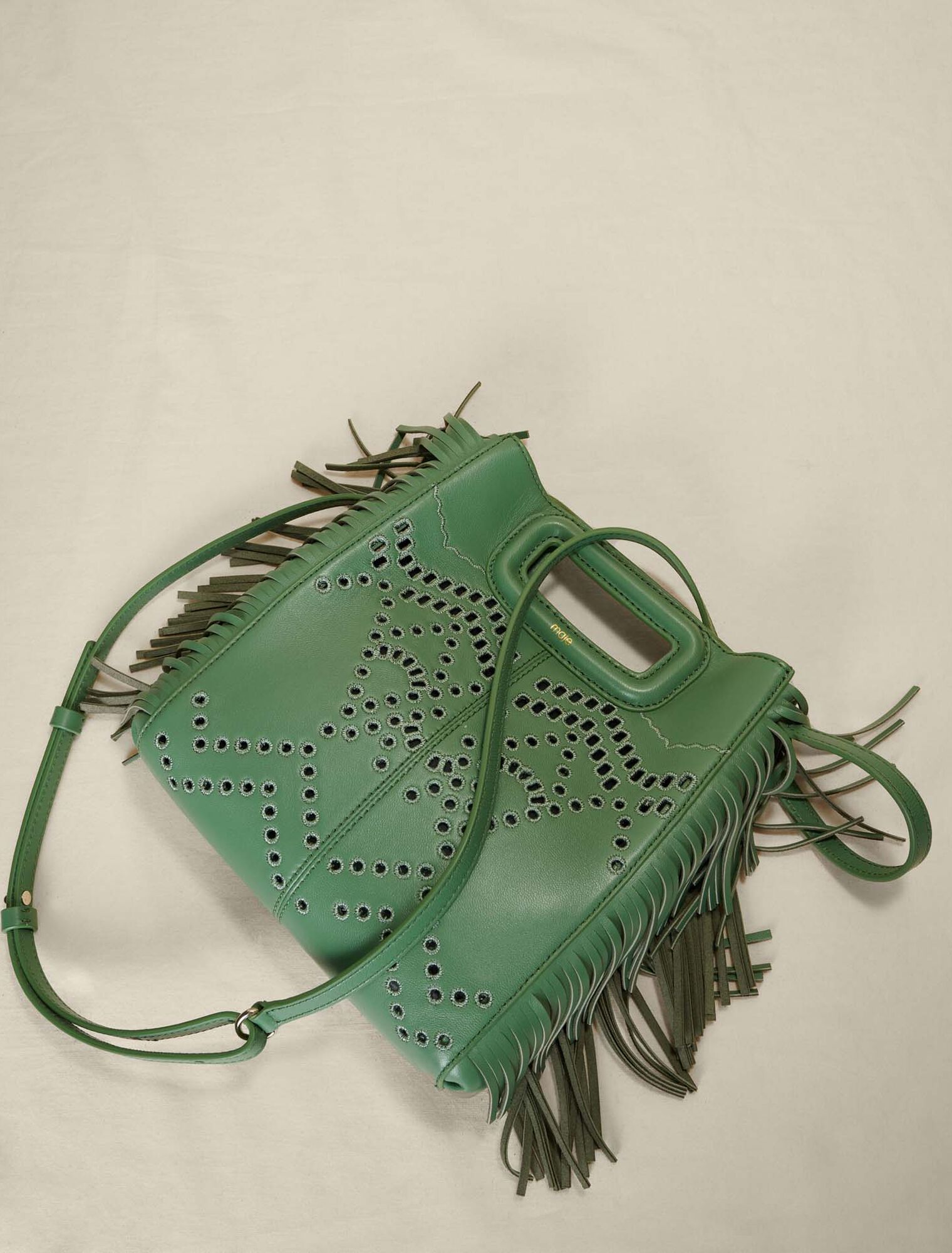 Perforated, fringed leather M bag