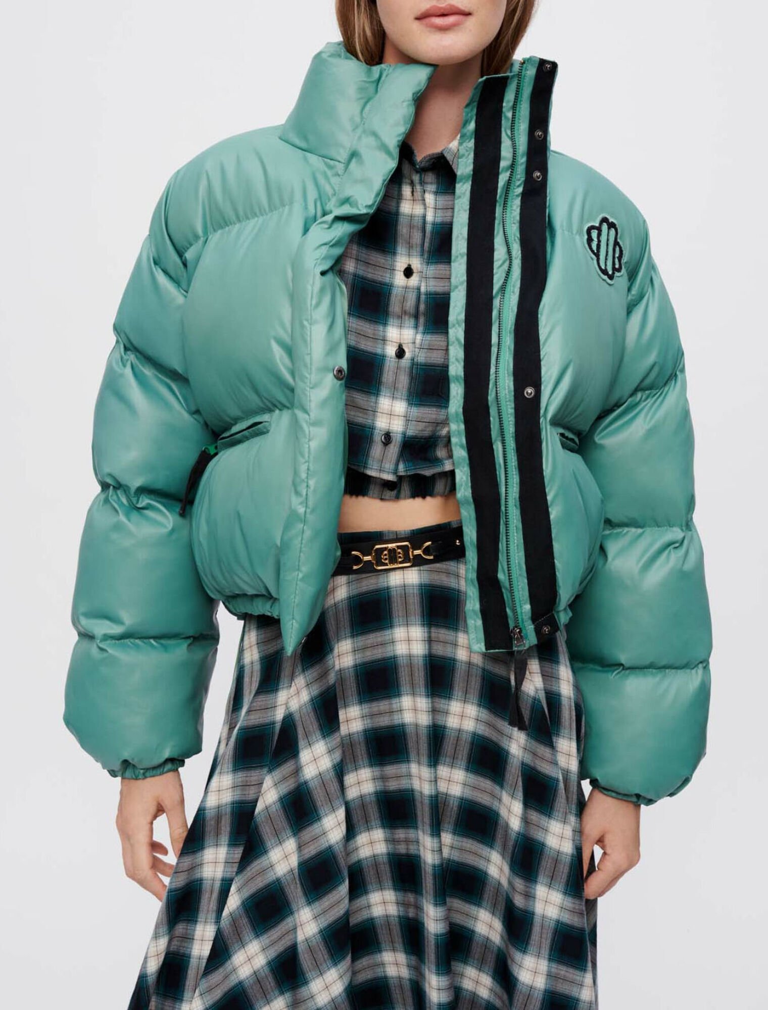 Green down jacket with Maje Clover patch