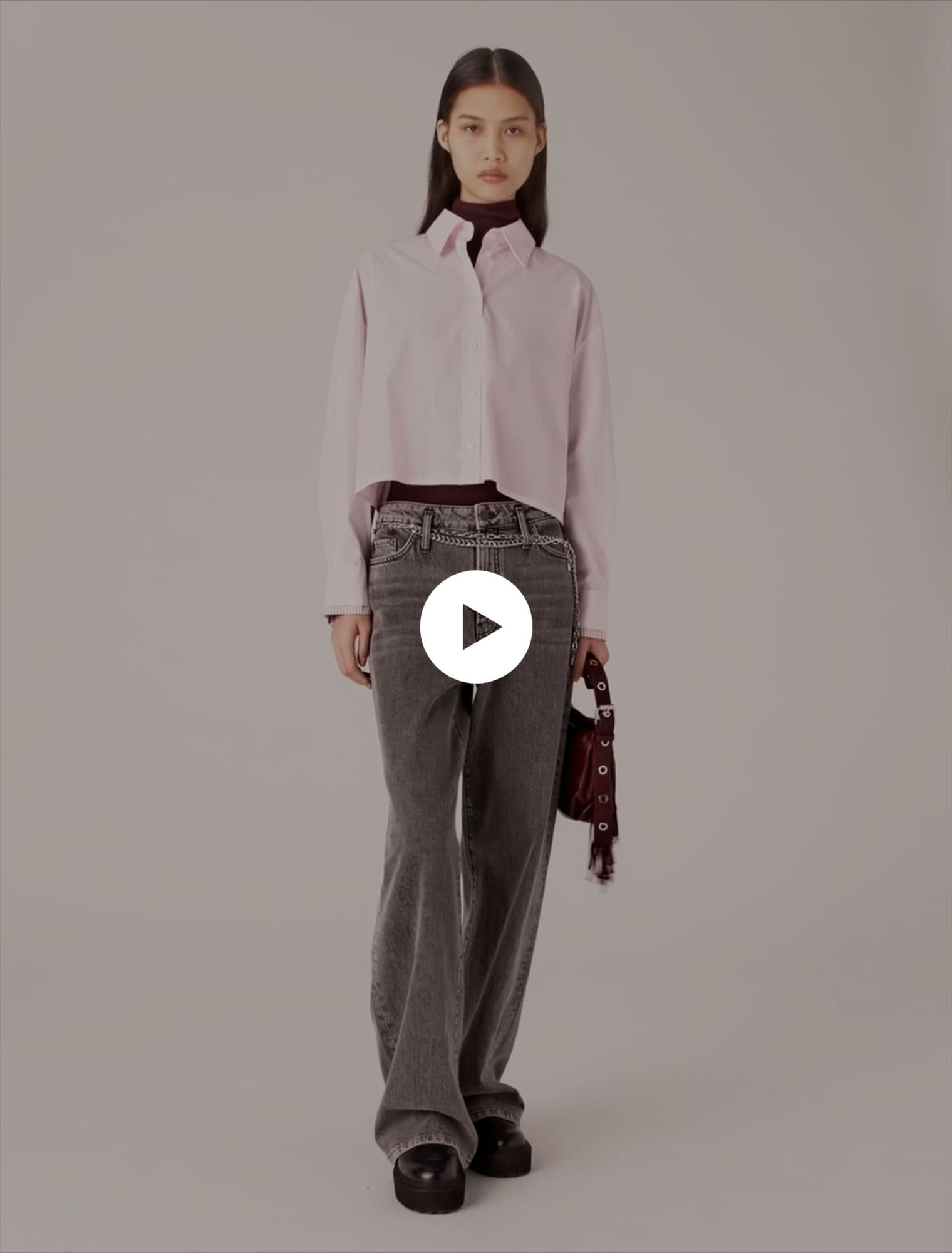 Wide-leg jeans with chain-link belt