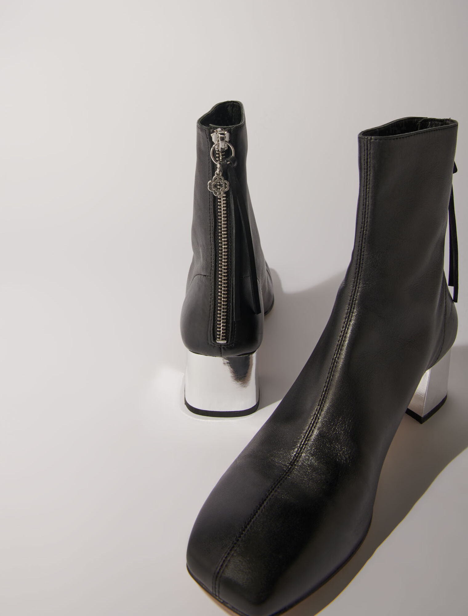 Square-toed leather boots