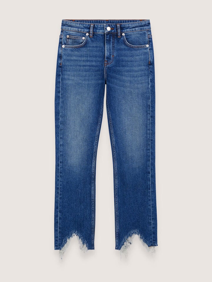 Slim-fit jeans, ripped at the bottom