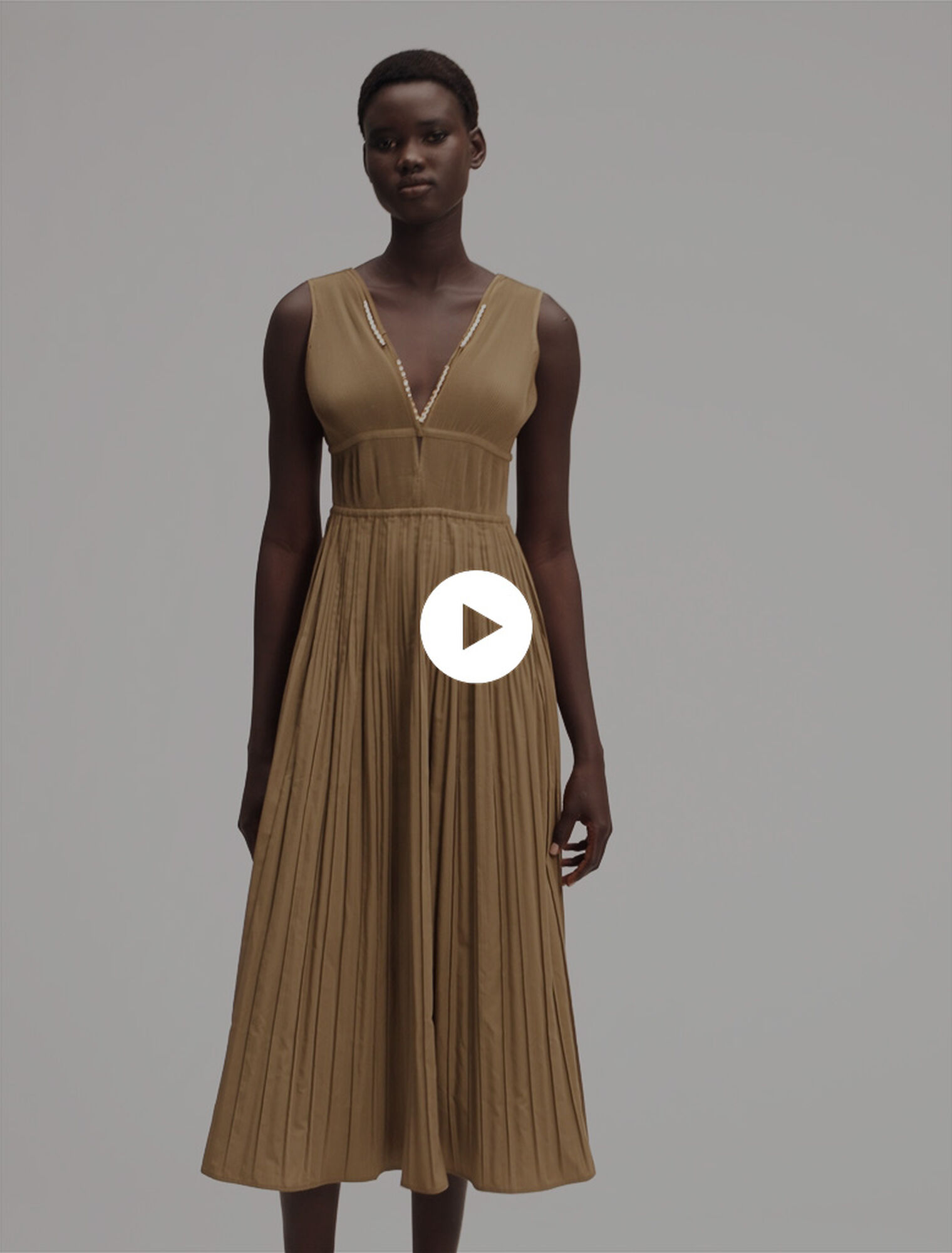 Jewellery neckline pleated dress