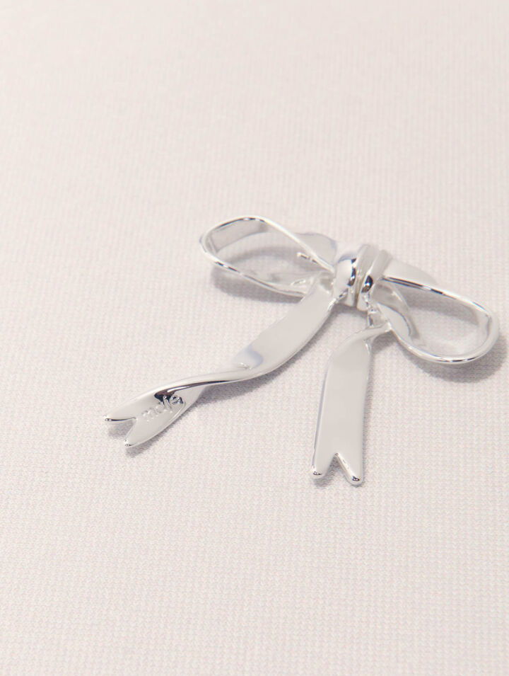 Silver bow earring