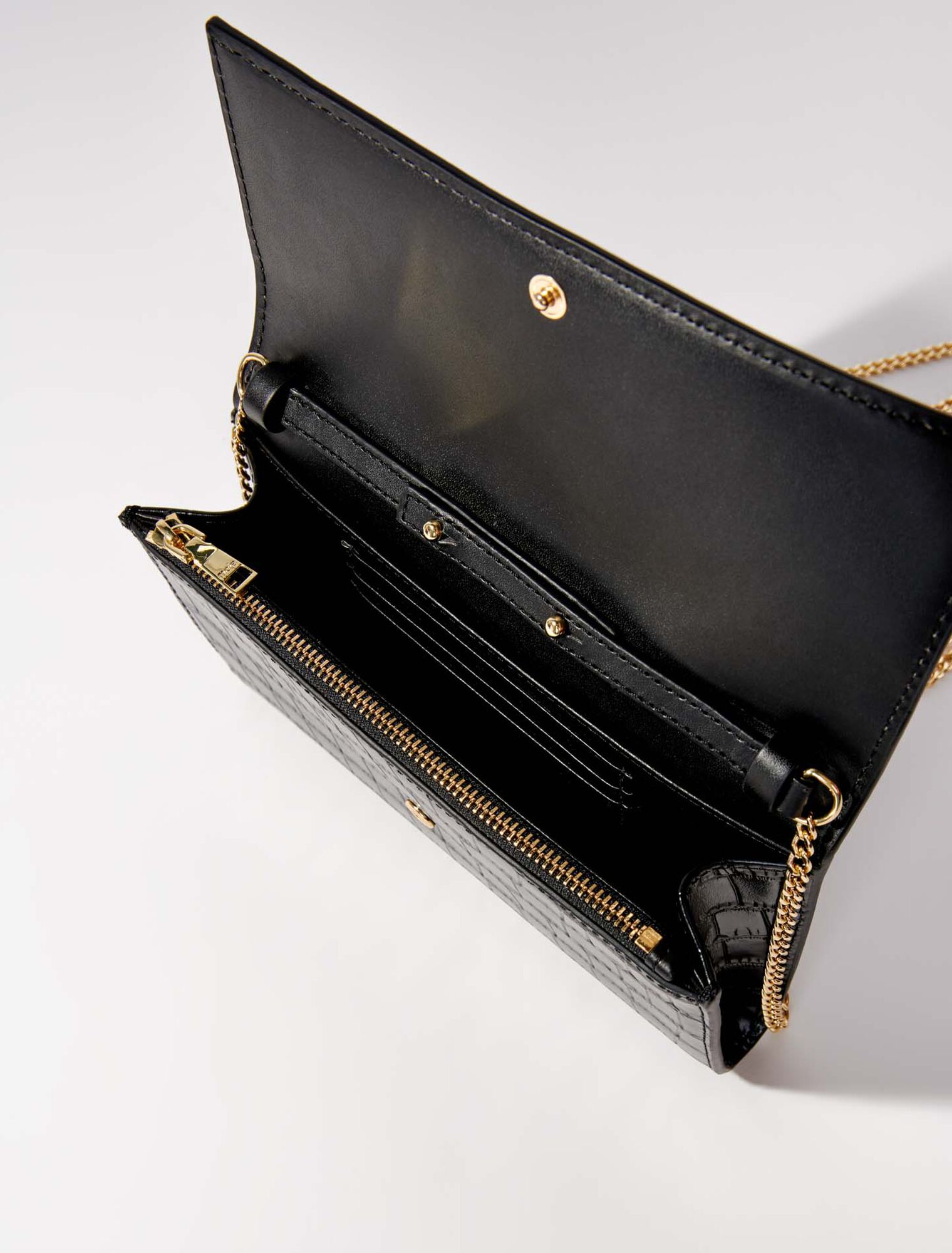 Croc-effect embossed leather bag