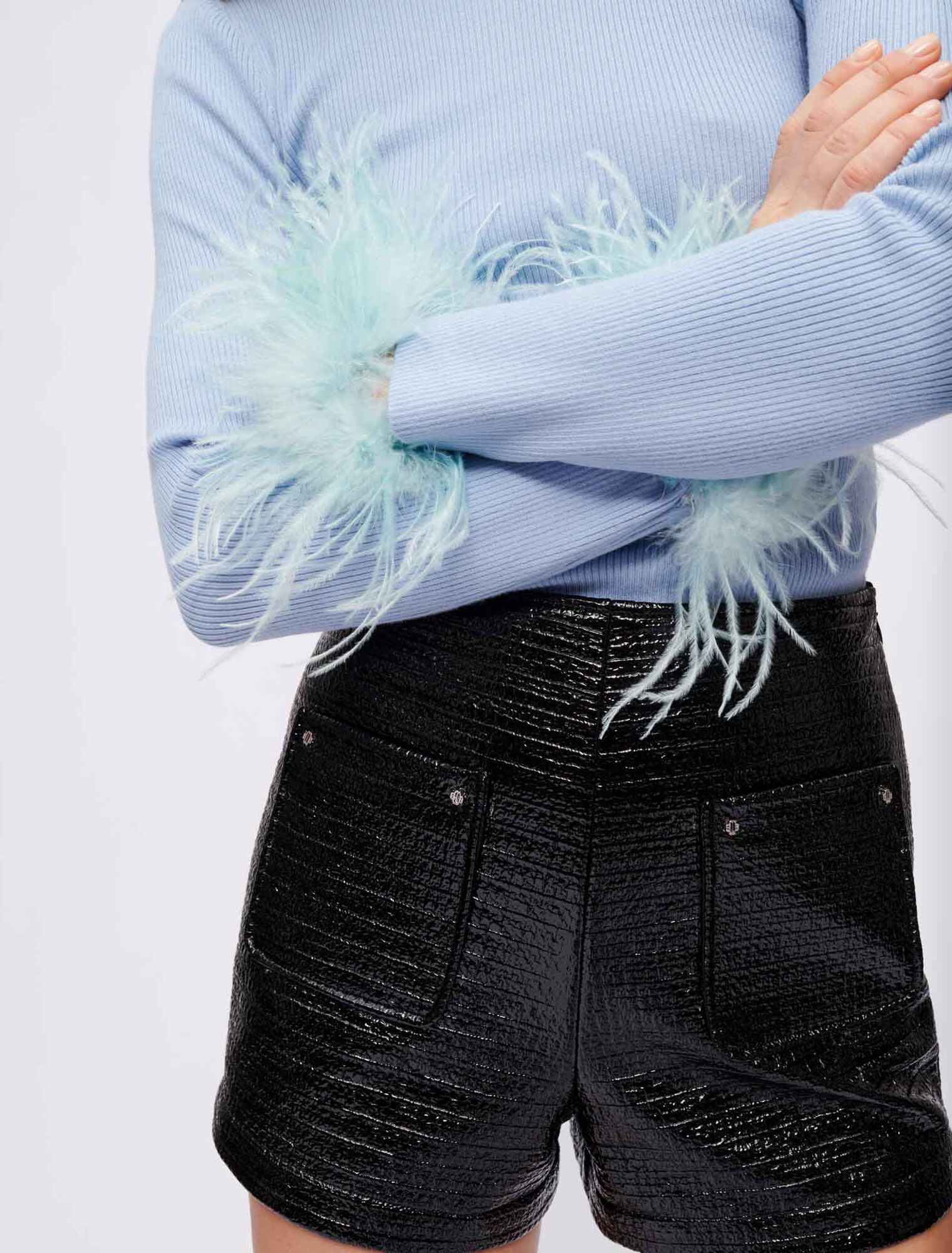 Turtleneck pullover with feathered cuffs