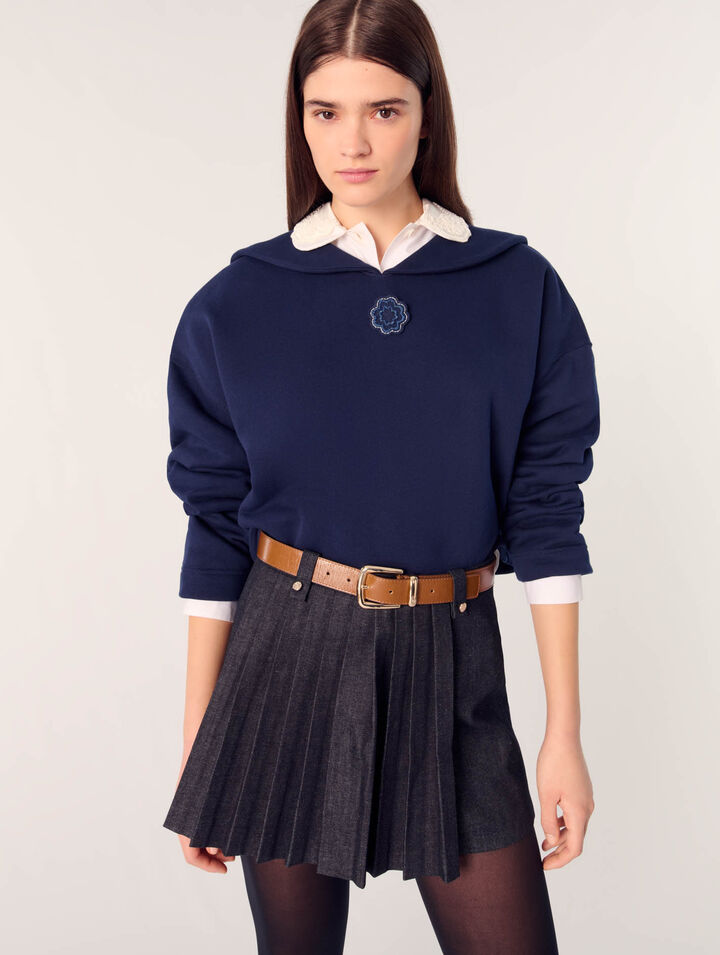 Short sweater with embroidery