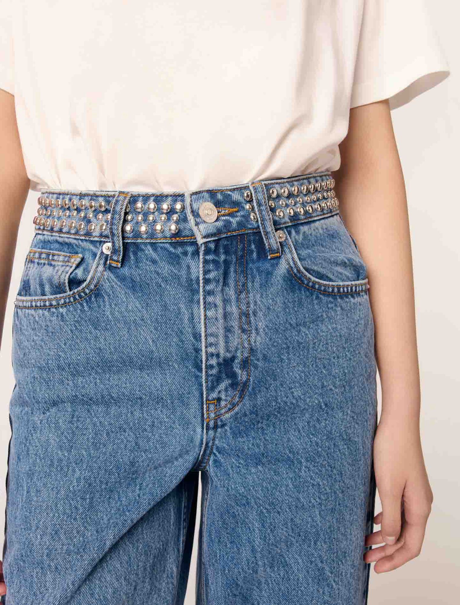 Flared jeans with studded waistband