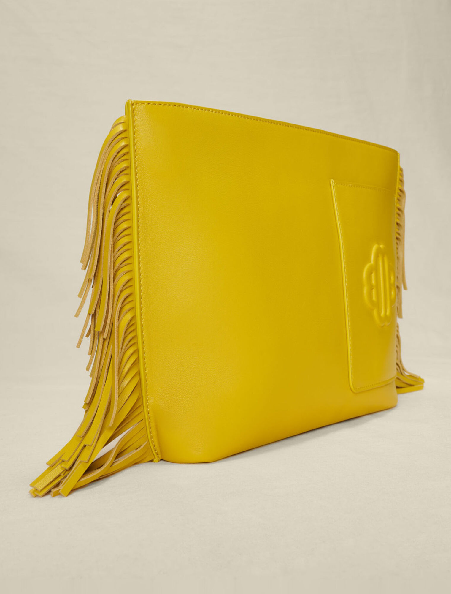 Fringed leather clutch bag