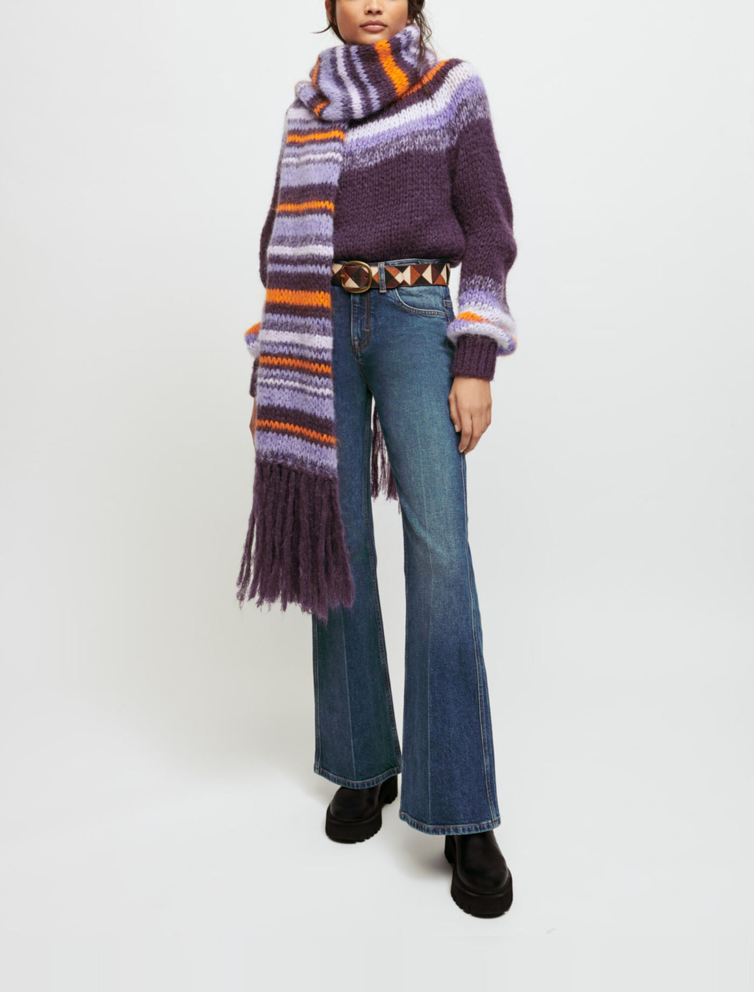 Flared jeans with horsebit detail