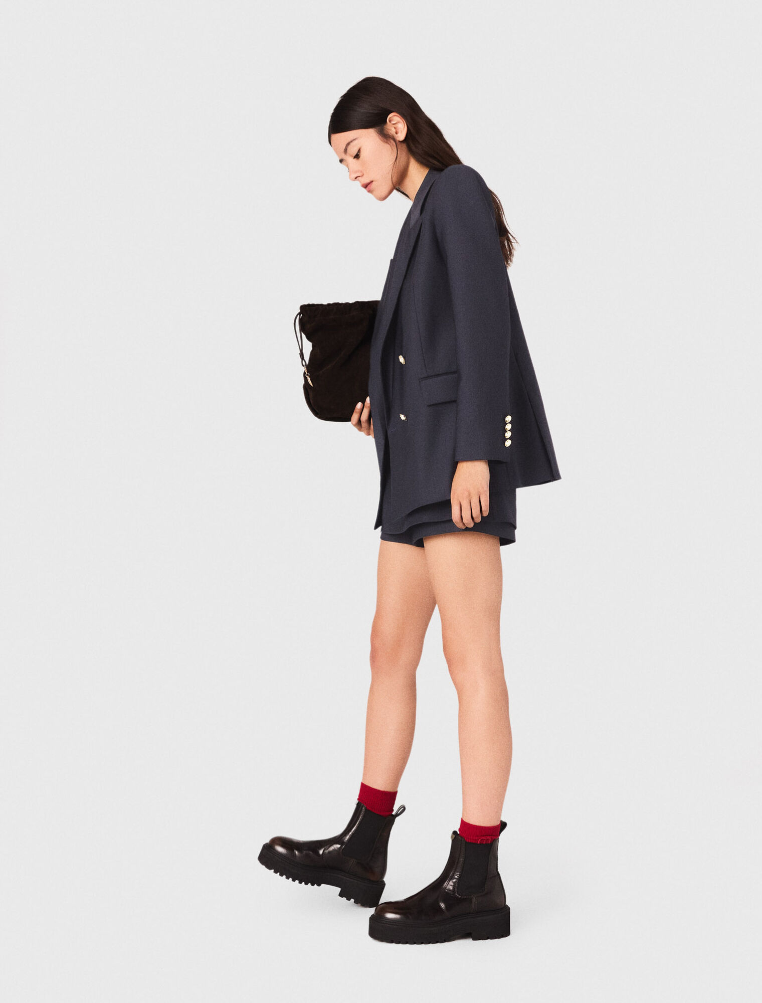 Suit jacket with gold buttons
