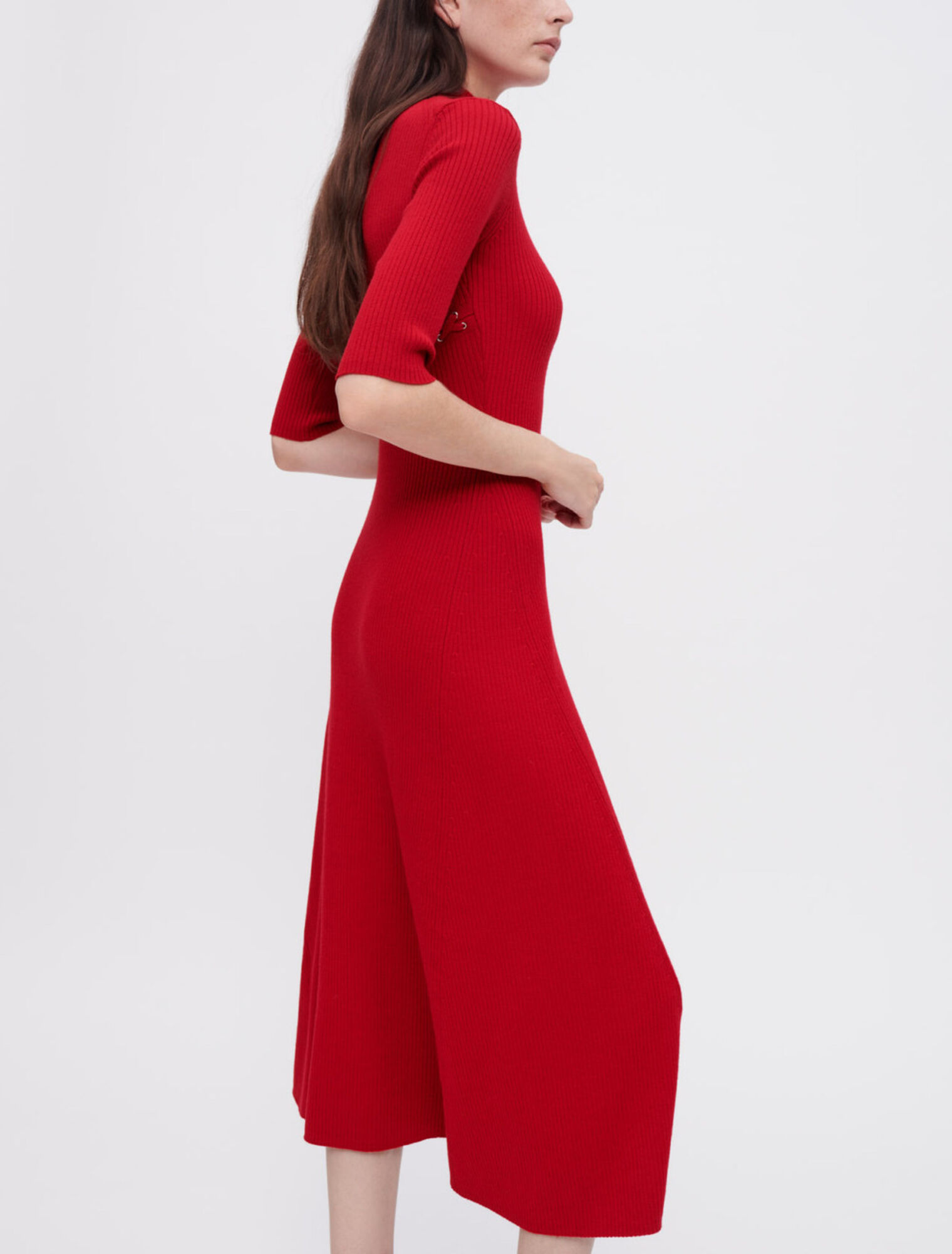 Ribbed knit dress with gold eyelets