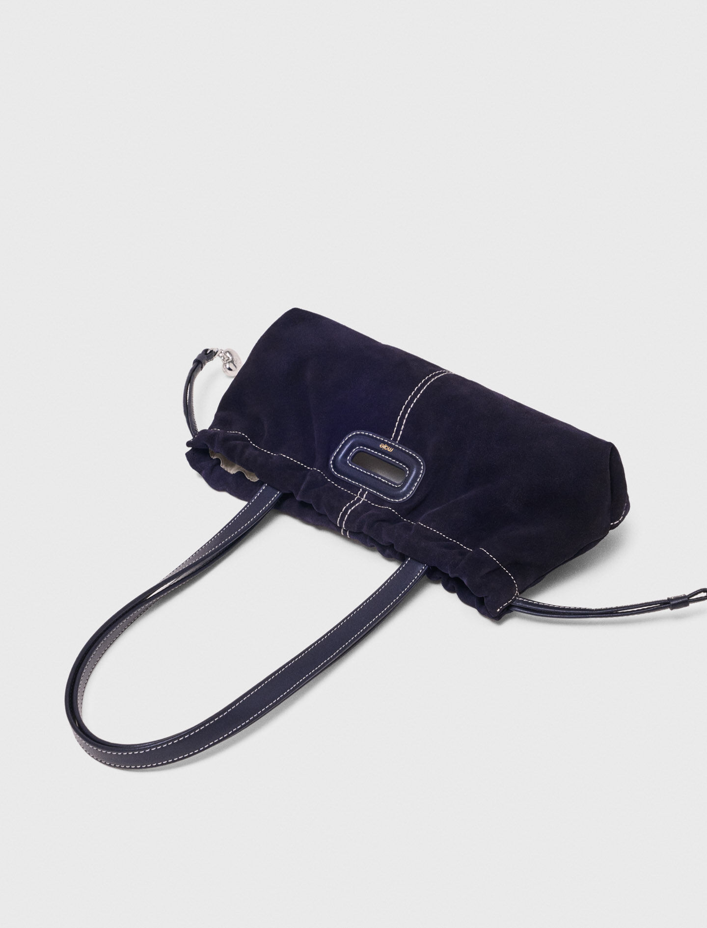 Leather bag with clover clasp