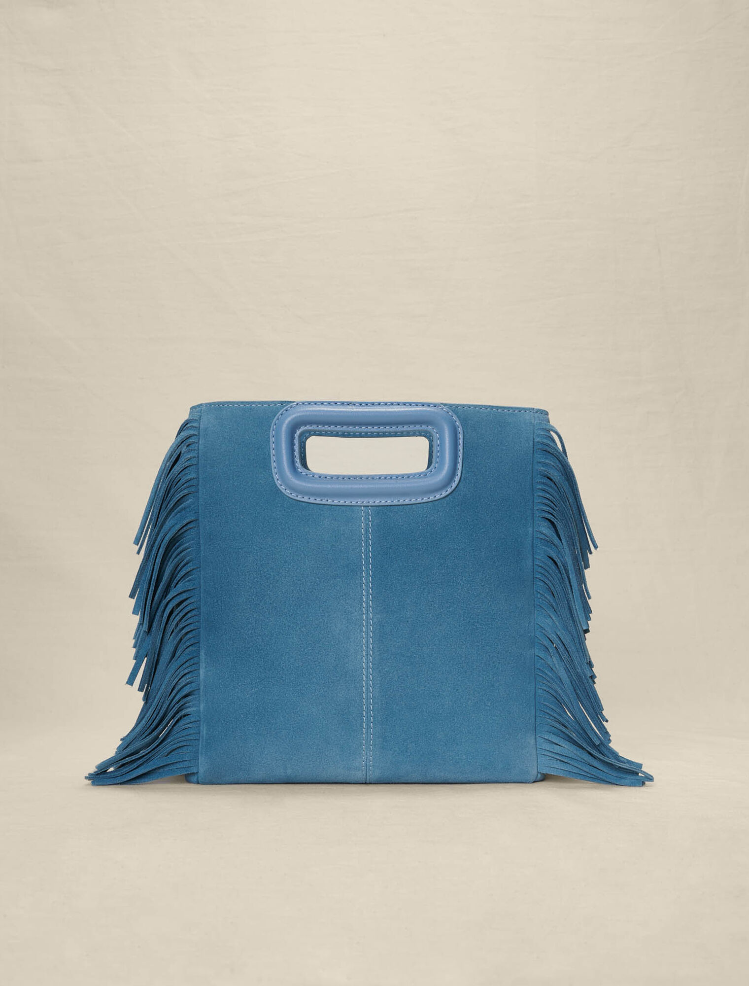 Studded leather M bag with fringing