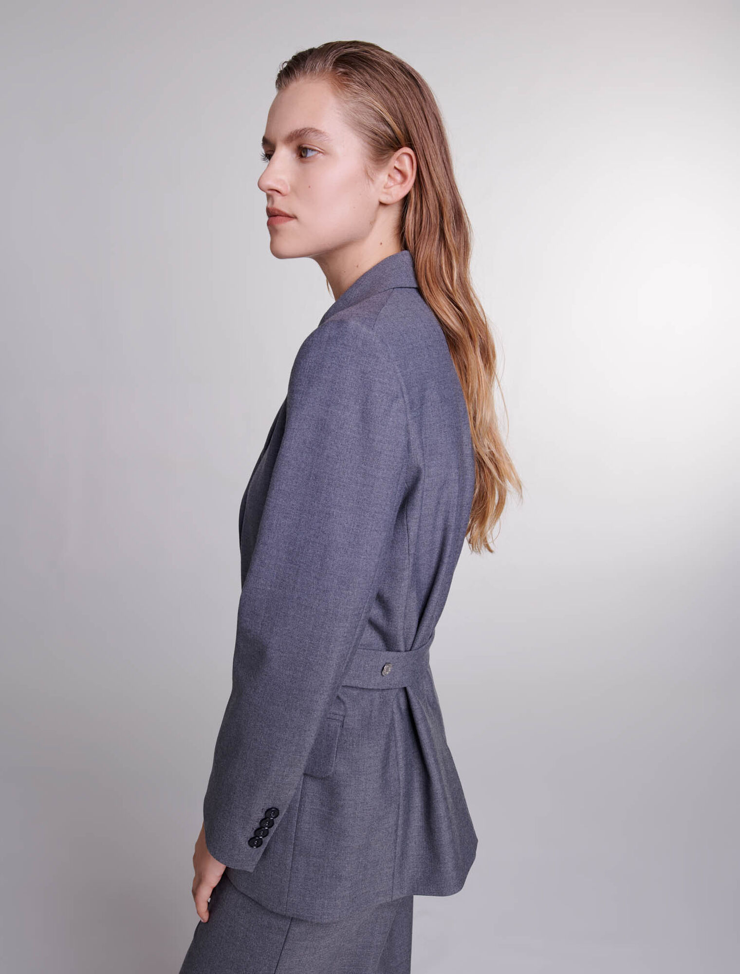 Suit jacket with chain belt