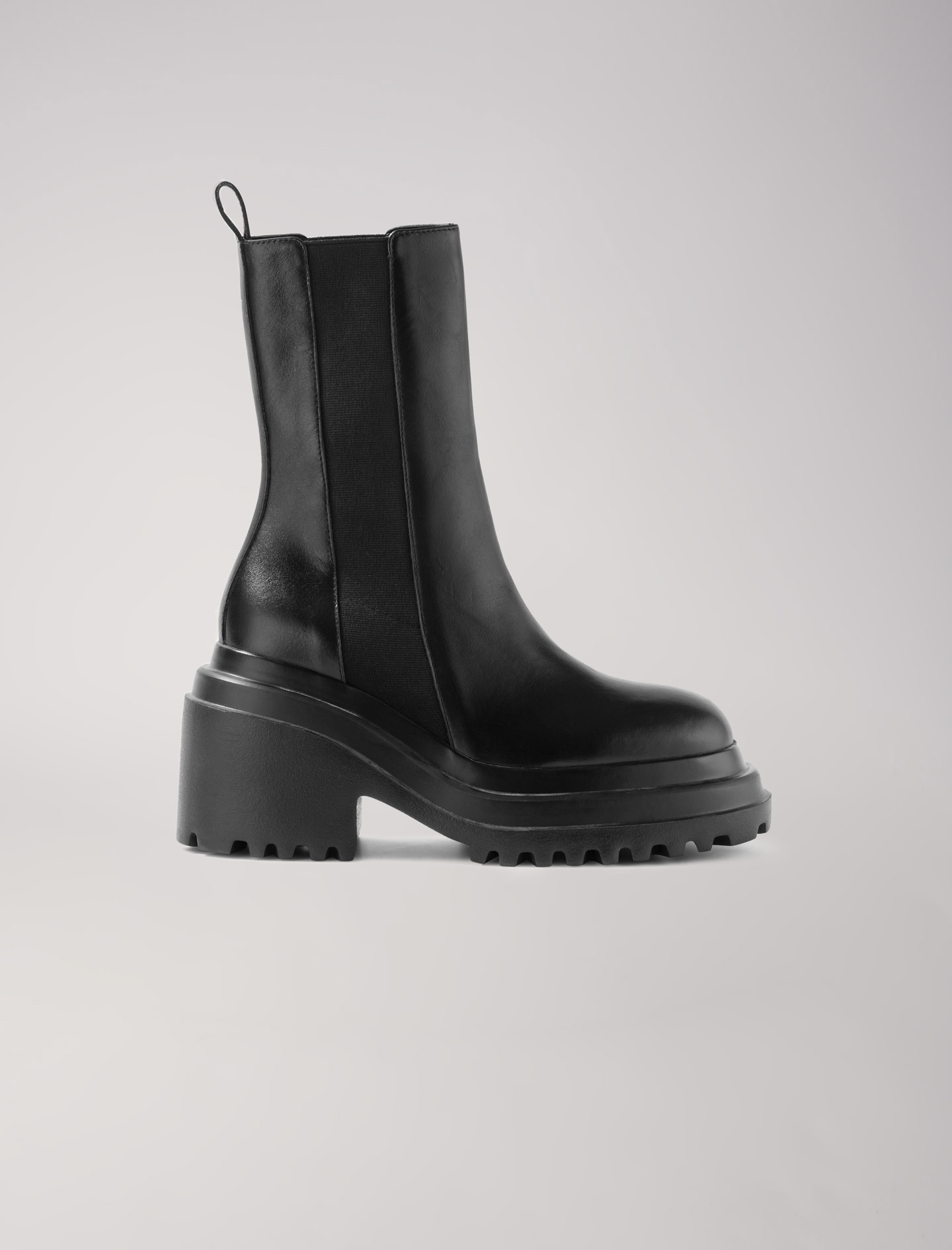 Maje Woman's Ethylene vinyl acetate Upper: Leather ankle boots, in color Black / Black
