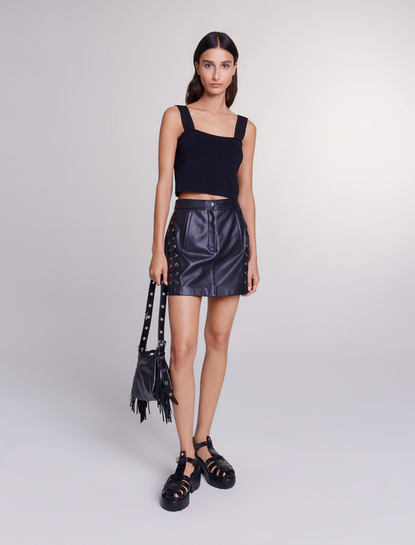 Maje Woman's polyester Yoke: Short leather skirt for Spring/Summer, in color Black / Black